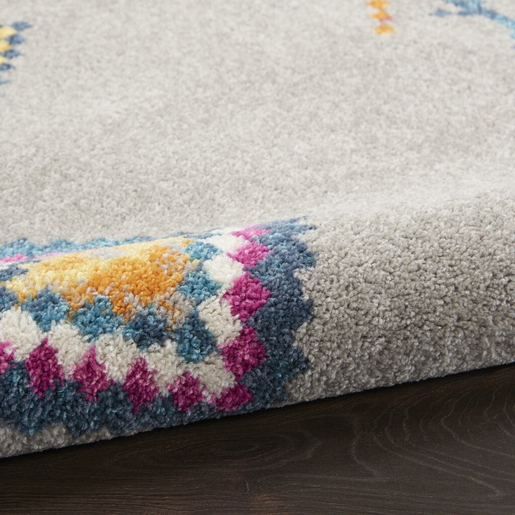5' X 7' Gray And Multicolor Geometric Area Rug