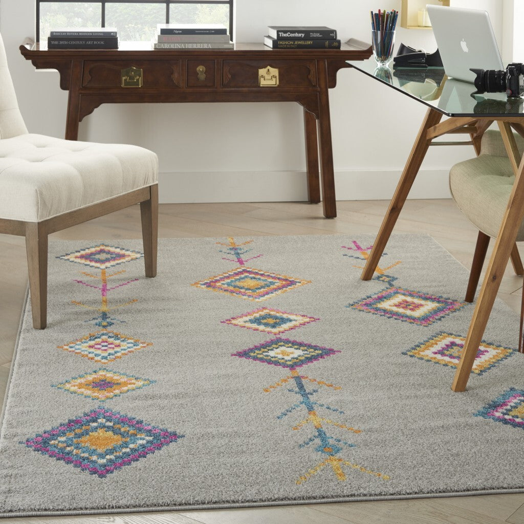 5' X 7' Gray And Multicolor Geometric Area Rug